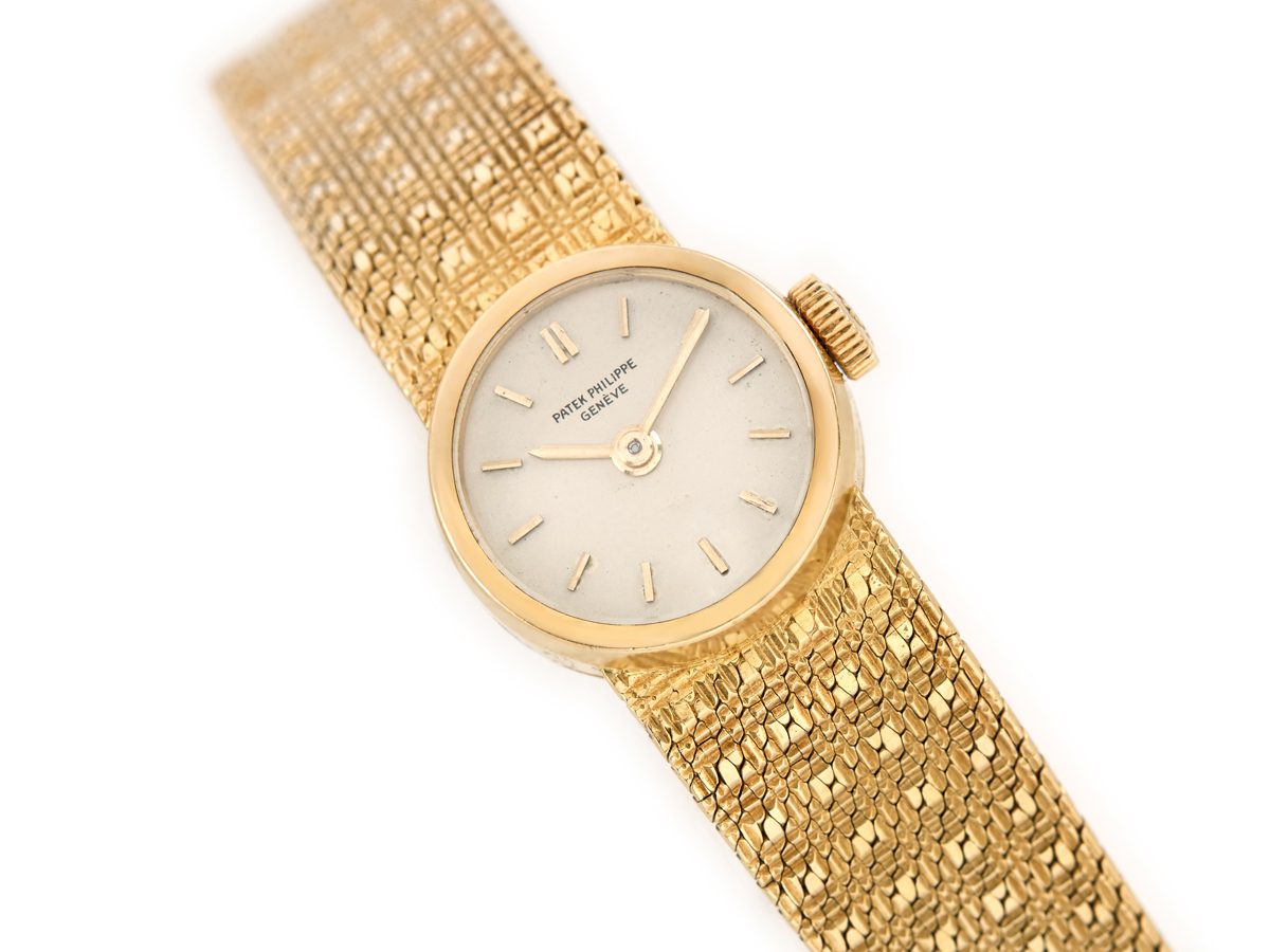 PATEK PHILIPPE, CALATRAVA DOUBLE-SIGNED TIFFANY & CO, REF 3802/205J,  YELLOW GOLD BRACELET WATCH WITH DATE AND RETAILER SIGNATURE, CIRCA 2000, Important Watches, 2020